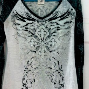 Washed out shirt with embellishments. Long sleeve.